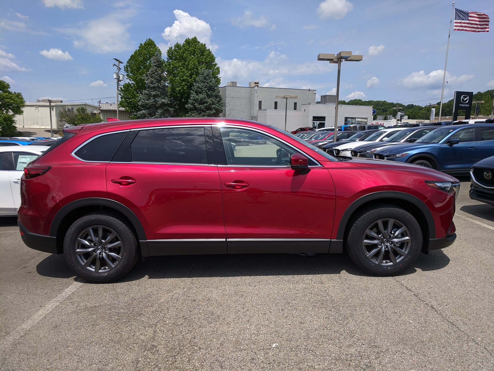 New 2020 Mazda Mazda CX9 Touring in SOUL RED CRYSTAL METALLIC